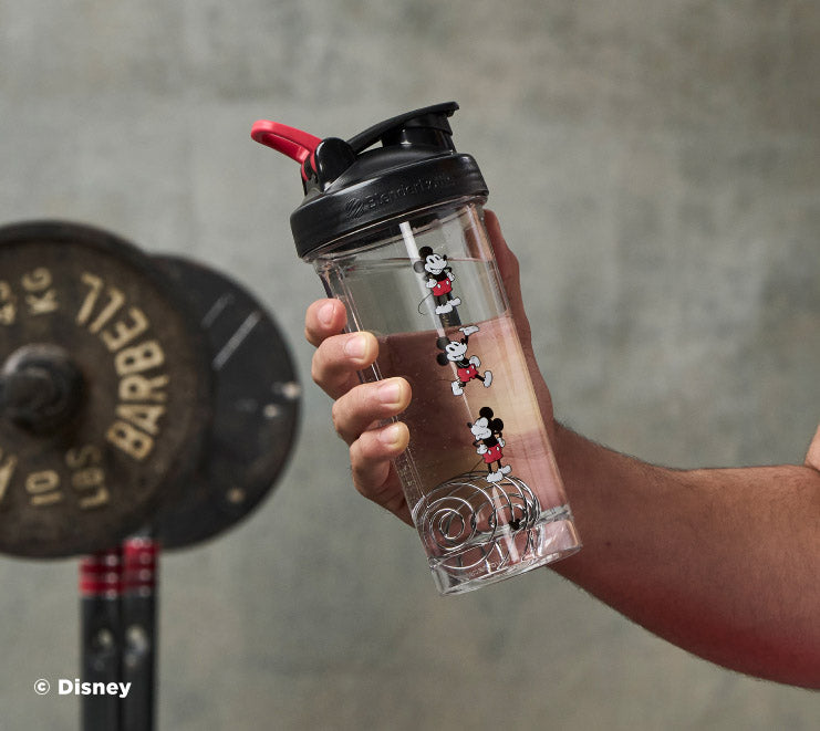 pro-series-t5 Mickey_Mouse_Protein_Shaker_Bottle_Being_Held_In_the_Gym.jpg
